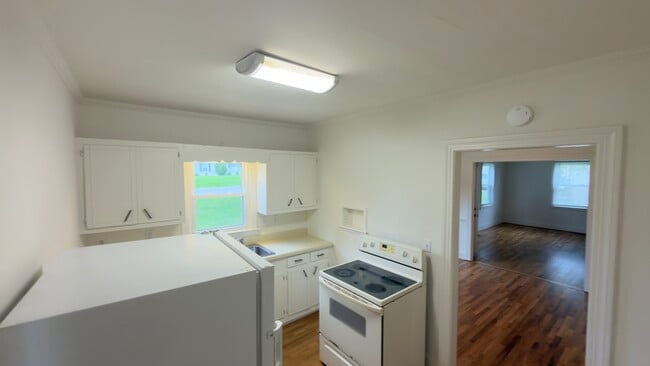 adding microwave above stove - 1230 N Dixie Ave