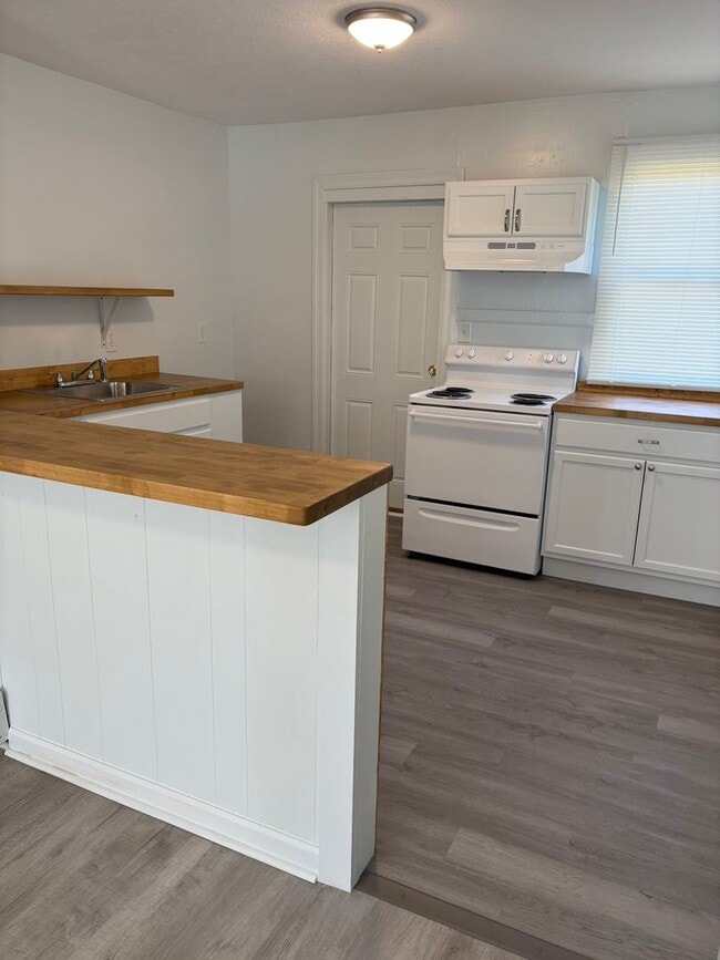 Photo - Charming 2-Bedroom Home with Spacious Yard