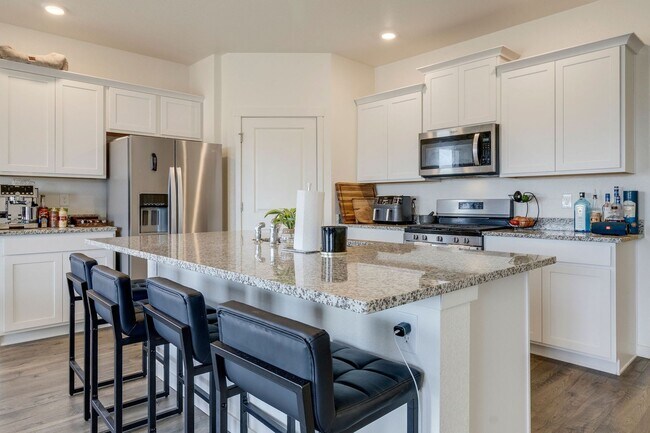 Photo - Modern 4-Bedroom Ranch Home with Mountain Views and 3-Car Garage