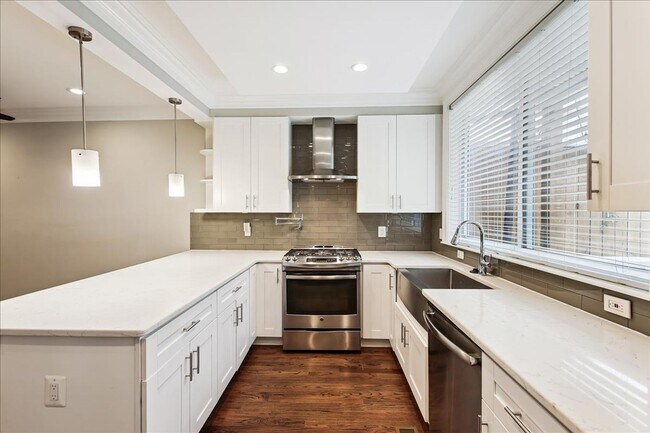 Photo - Modern 4BR Home w/ Fireplace, In-Law Suite + Parking in Prime DC Location!