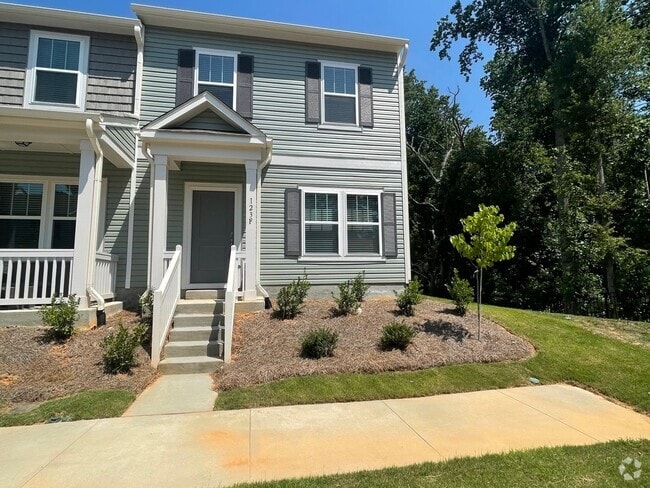 Building Photo - READY IN AUGUST 3 br 2.5 Townhome Near His...
