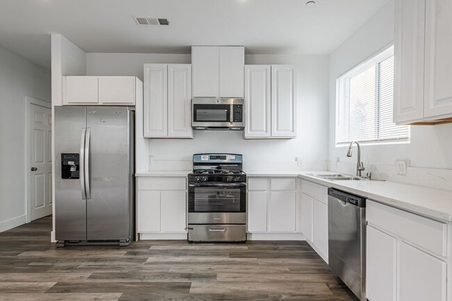 Photo - Spacious 4-Bedroom, 3-Bath Home – Modern Upgrades & Parking Included Unit 2833