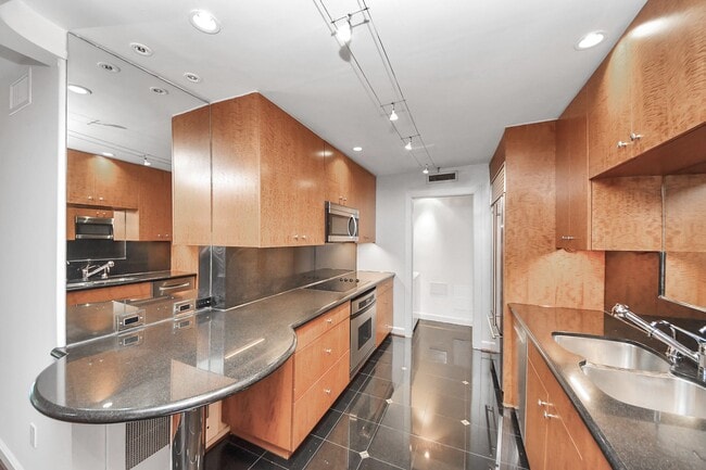 Building Photo - 5050 Ambassador Way Unit 306 Rental