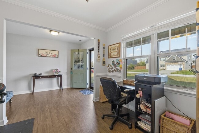 Photo - 3 Bedroom + Bonus Room Home with Main Floor Primary Suite & Community Pool Access