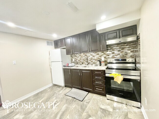 Photo - Modern 1+Den Basement Apartment – Bright &... Unit 2
