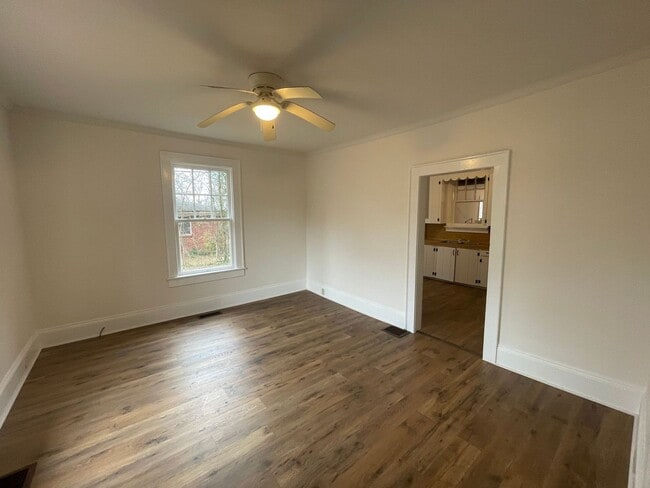 Photo - 4 bedroom 2 bathroom house available!   Freshly Painted-New Flooring