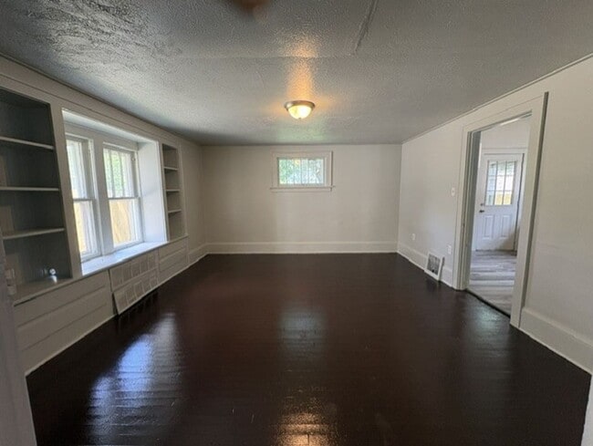 Photo - Spacious Akron Single-Family Home with Front Porch, Dining Room, Fireplace & Backyard!