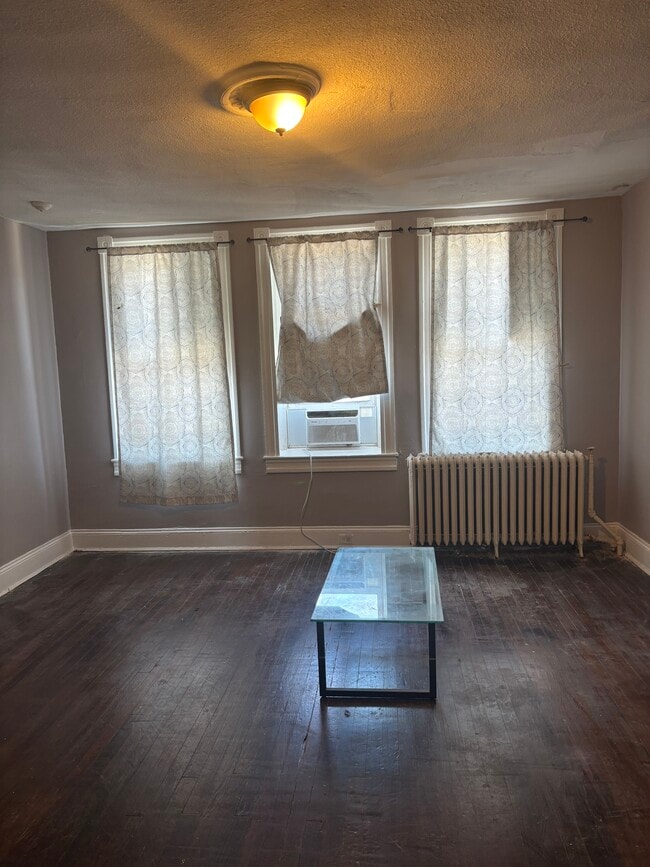 Building Photo - 2839 N Calvert St Unit 3