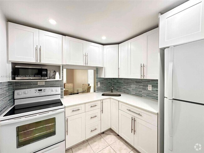 Building Photo - 601 Three Islands Boulevard Unit 210 Rental
