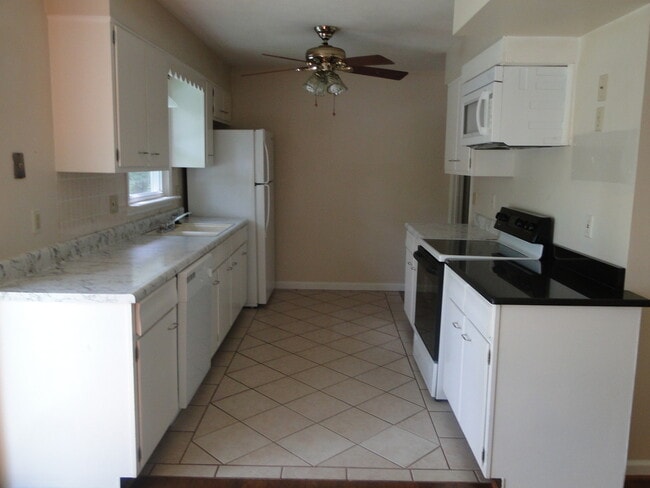 Photo - Fenced Backyard In Quiet Neighborhood