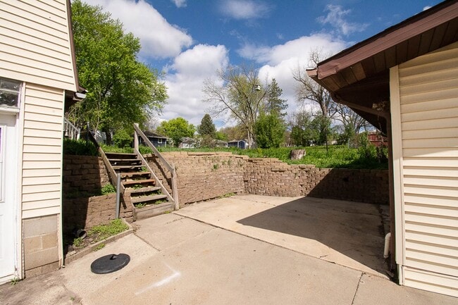 Photo - Bright, beautiful home with 3 garage spaces & tons of storage!