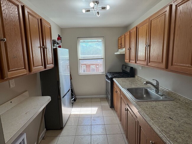Building Photo - Spacious 3-Bedroom Condo in Randle Heights!! Unit 202