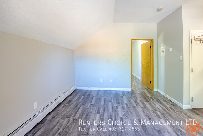 Photo - MAIN FLOOR UNIT With Assigned Parking and Onsite Laundry