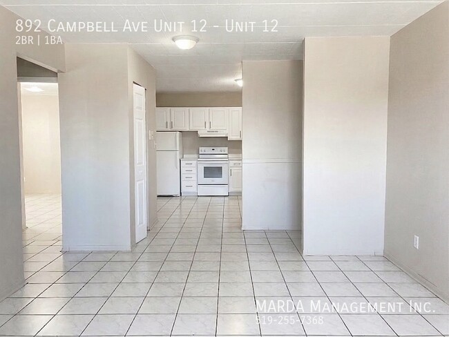 Building Photo - SPACIOUS 2 BED/1 BATH APT ON CAMPBELL + HYDRO Unit 12