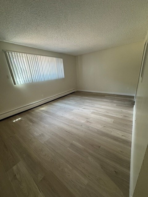 Sala de estar - Twin Fountain Apartments