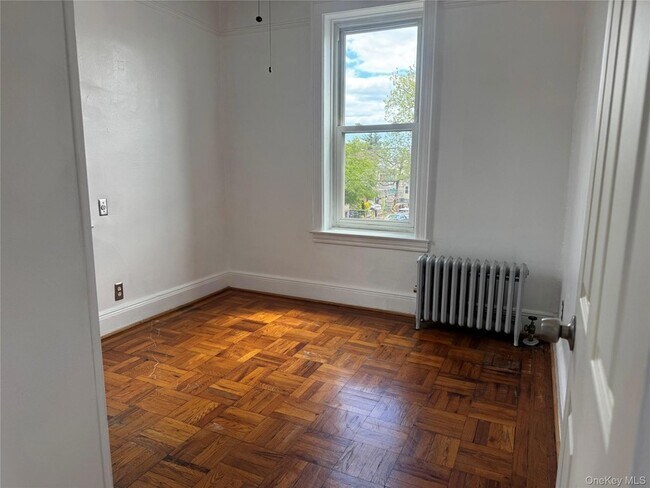 Photo - 74-38 Jamaica Ave