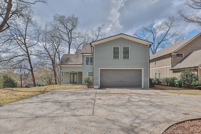 Photo - Stunning 4BR/3.5BA Home Near Country Club of Columbus | 2,800 SF | 2-Car Garage — $2,800/mo
