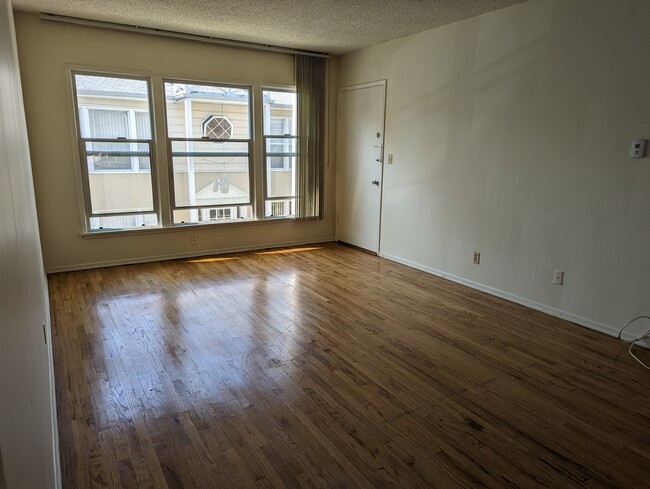 Bright living room - 122 N Lamer St Apartments Unit Lamer  C