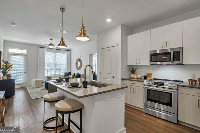 Building Photo - 300 Prominence Point Pkwy Unit 4306