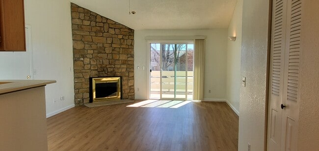 Living Room. - 10251 W 44th Ave Apartments