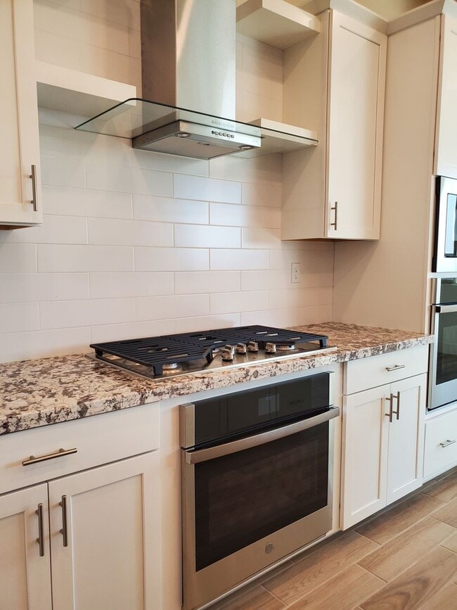 Photo - Next Gen Home with main house and guess unit in Spring lake Area