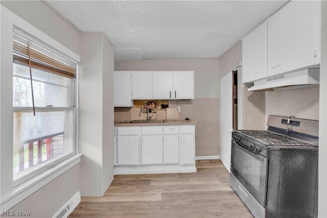 Photo - 7945 Lorain Ave Unit 7947/Back House