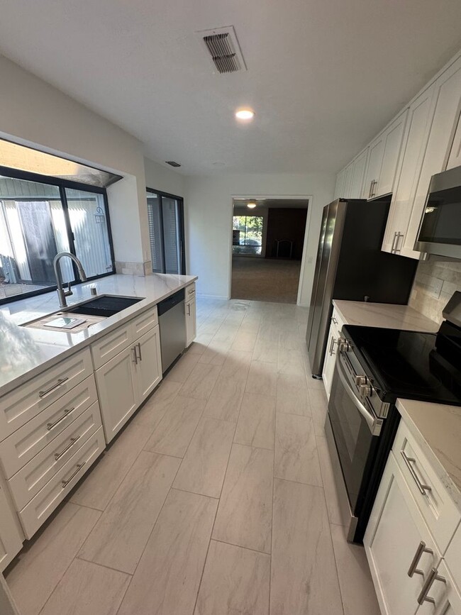 Photo - BEAUTIFUL 2 STORY CONDO IN THE CAMPUS COMM...