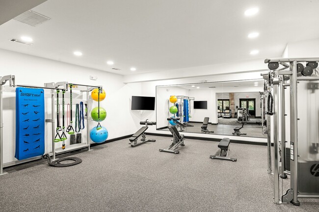 Cardio and Strength Training Fitness Center with Stretching Area