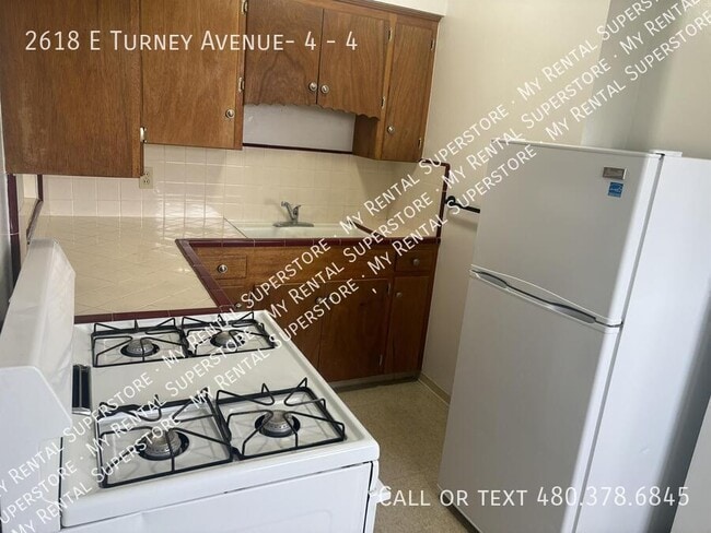 Building Photo - 2618 E Turney Ave Unit 4