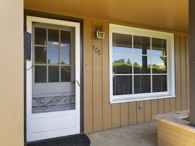 Photo - Occupied, do not disturb tenants. 2br duplex with carport and stackable washer/dryer included!