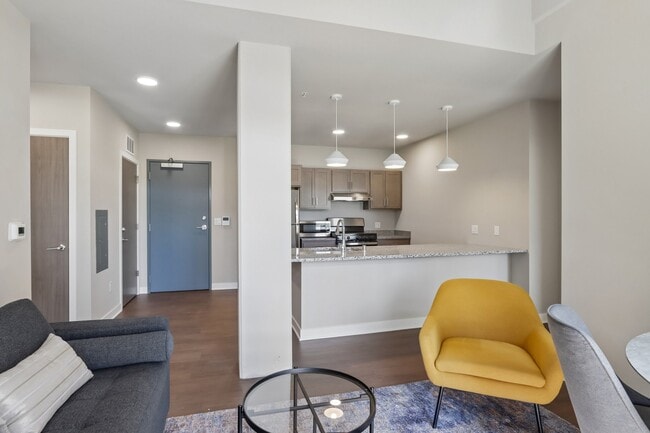 The View at Huxley Yards Apartments in Madison, WI Living Room into Kitchen