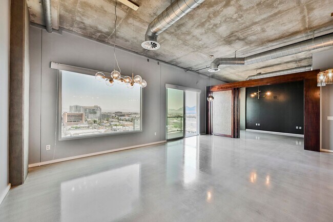 Photo - Modern Industrial Loft at Soho Lofts – 1BR/2BA High-Rise in the Arts District, City & Mountain Vi... Unidad 901