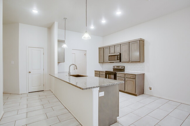 Photo - "Charming 2-Bed Oasis with Granite Eleganc...