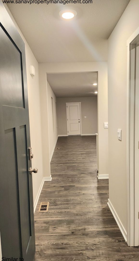 Photo - Single Family Ranch Home with a Finished B...