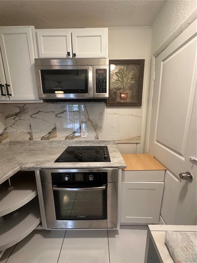 Building Photo - 7606 Embassy Blvd Unit REAR