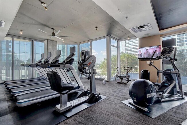 Gym Amenities w/ pool view - 360 Nueces St Unit 2409