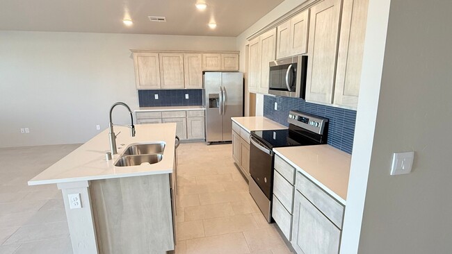 Photo - Light and airy 3-bed, 3-bath townhome in one of the area’s most highly desired Red Hawk area.