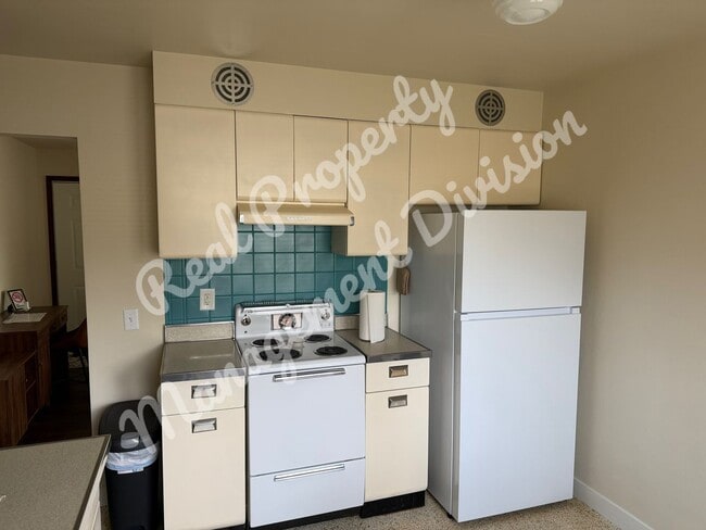 Photo - **Charming 2-Bed, 1-Bath Home with Retro Flair + Garage & Yard**