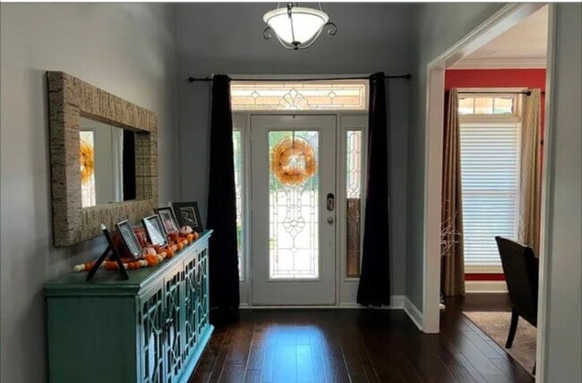 Photo - five bedrooms, five and a half bathrooms, a year-round heated swimming pool, and an ultimate back...