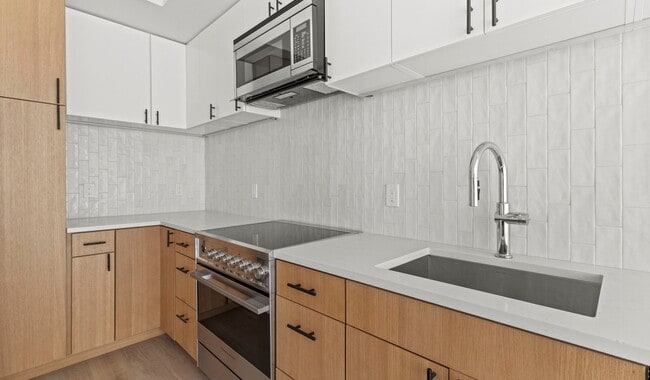 Your new home features dual-toned kitchen cabinety.