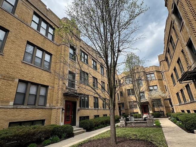 Building Photo - 1360 W Estes Ave Unit 2N