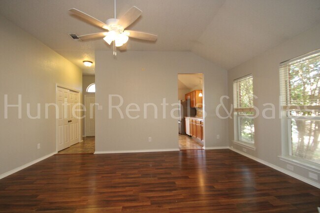 Photo - Exceptional Living with Vaulted Ceilings, Cozy Fireplace & Expansive Outdoor Space