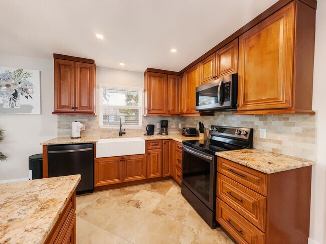 Photo - Discover the perfect Naples Park rental just minutes from the beach.