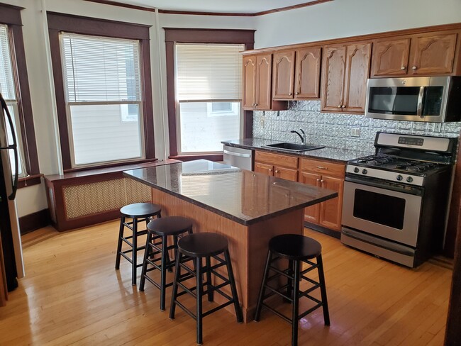 Stunning large kitchen with island - 220 Ontario St Apartments Unit B