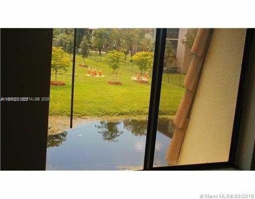 Building Photo - 11614 Royal Palm Blvd Unit 11614