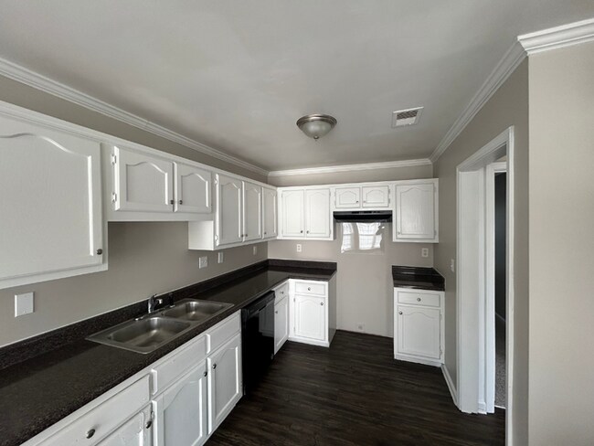 Spacious 4BR/2BA Olive Branch Home | 1,965 Sq Ft, Modern Fireplace, Bay Window & 2-Car Garage