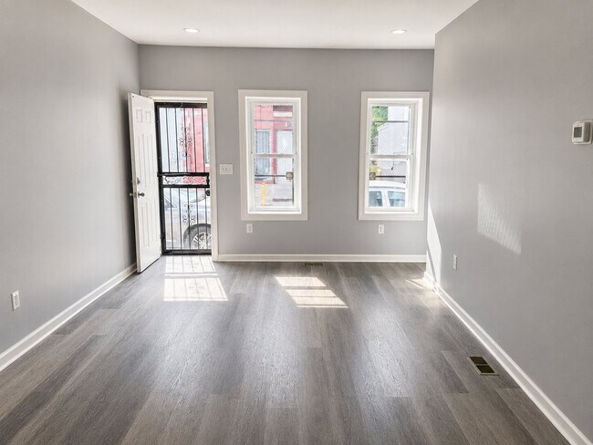 Photo - 3-Bedroom Home with Spacious Backyard and Central Air