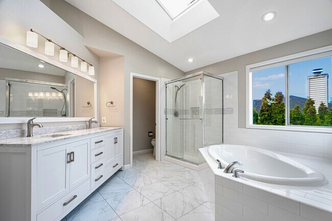 Photo - Spacious 5 Bedroom 3 Bath Home w/ 3-Car Garage and New Updates!