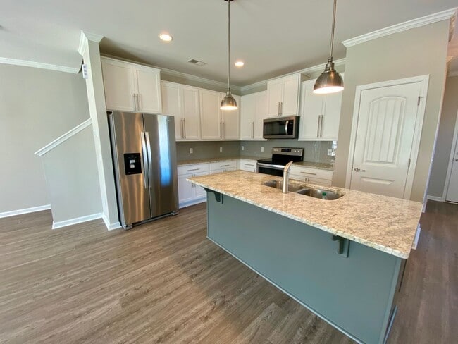 Photo - 3 bed/2.5 bath at end unit townhome in Berkeley Walk at Savannah Quarters with garage
