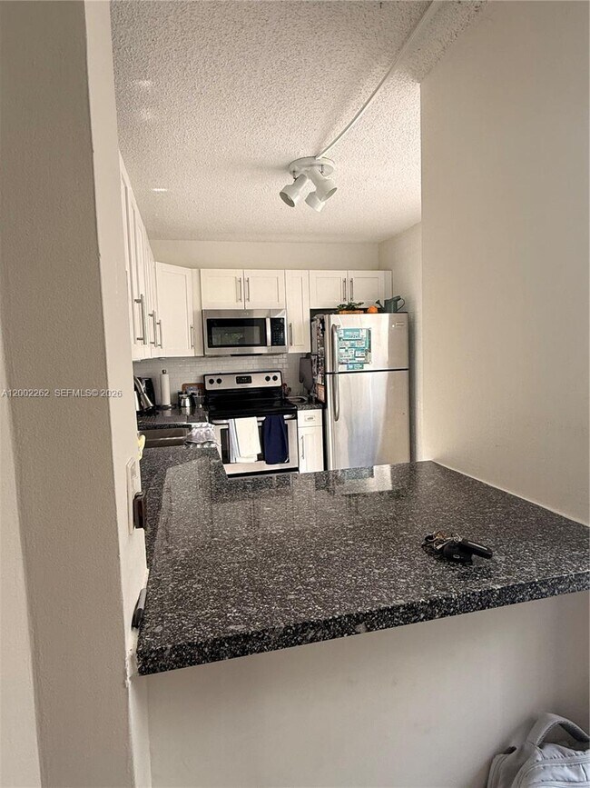Photo - 9440 Live Oak Pl Unit 304